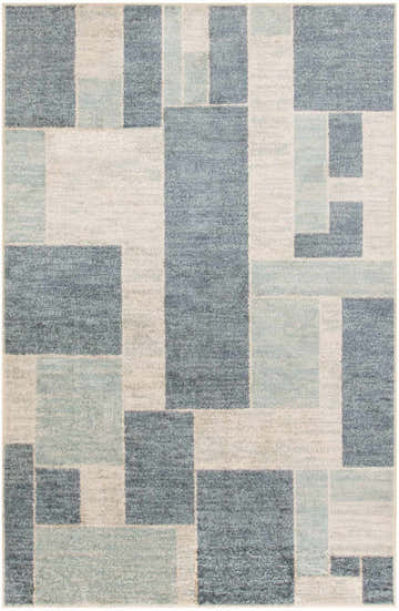 Close-up of Nourison Astra Blue Ivory Rug. Modern geometric design with blue, ivory, and gray rectangular shapes.