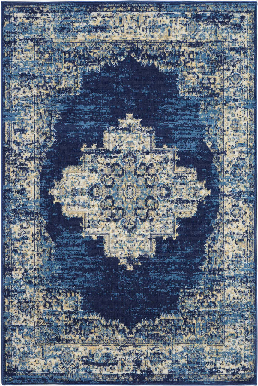 Close-up of the Nourison Grafix Navy Blue Vintage Area Rug, featuring a distressed floral medallion pattern.
