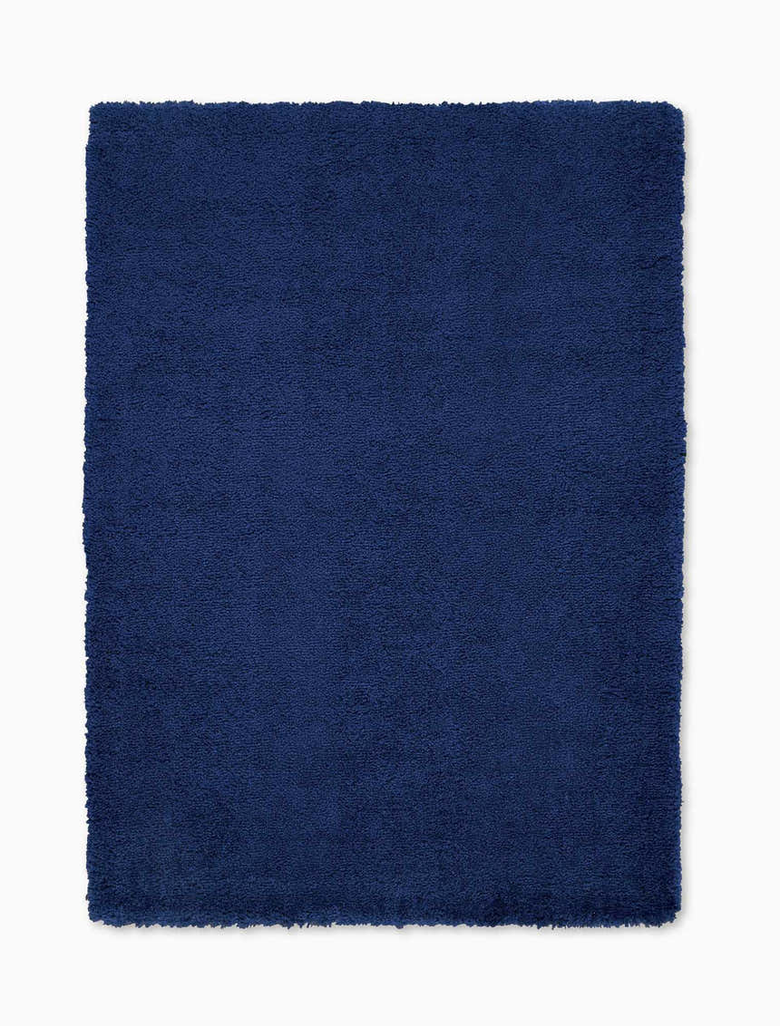 Close-up of the Calvin Klein Chicago Shag Navy rug. Soft, dense texture and rich navy color. Modern shag rug.
