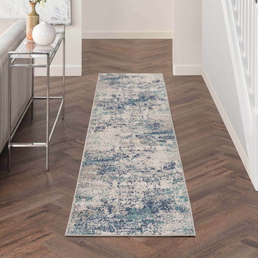 Hallway with Nourison Passion Ivory Teal rug runner, wood floors, and console table.