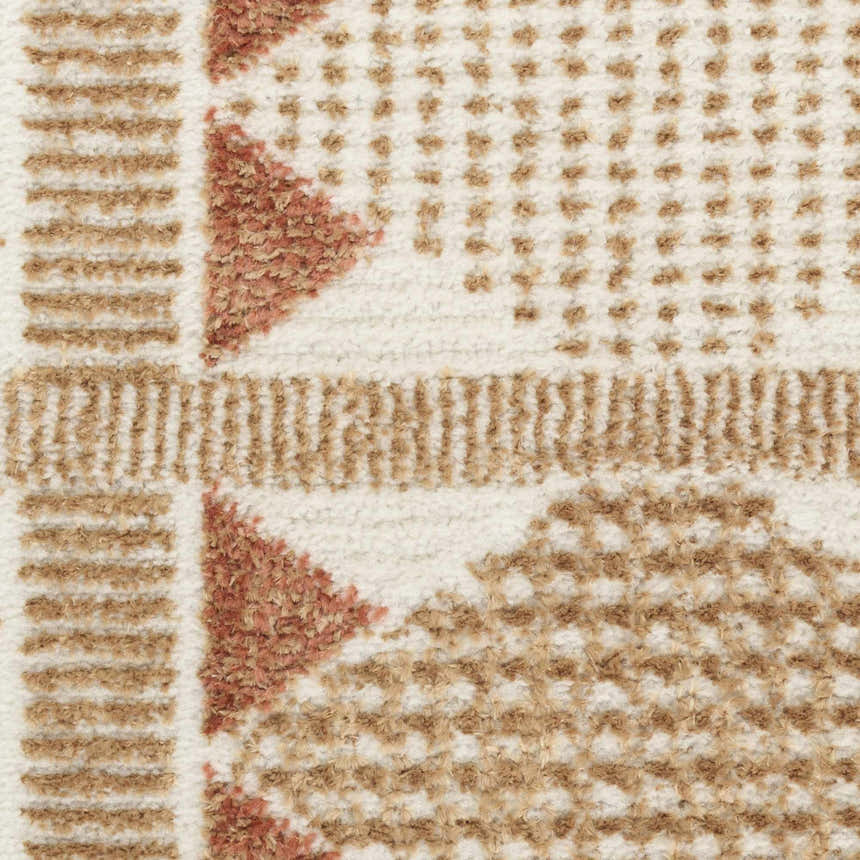 Close-up of the Nourison Nordic Rust Rug showing the geometric pattern and textured rust and ivory pile.