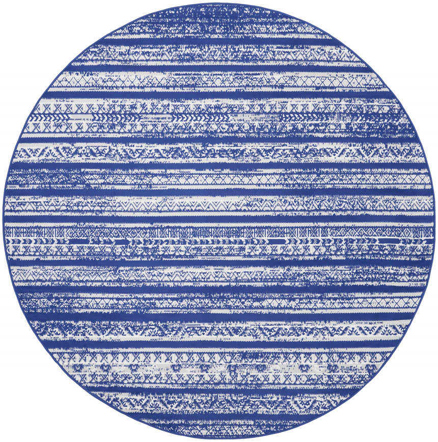Close-up of a round Nourison Whimsicle Navy Ivory rug with a bohemian striped pattern. Clearance item.