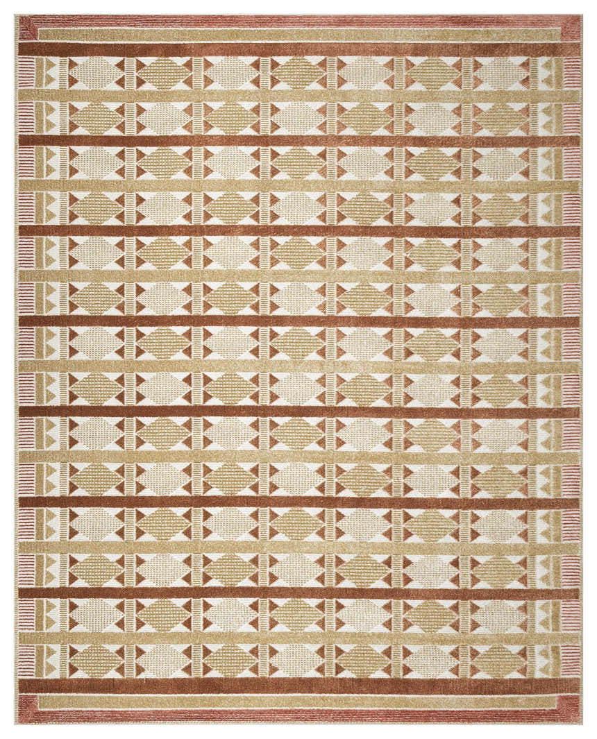 Close-up of Nourison Nordic Rust rug. Mid-century modern design with rust, tan, and cream geometric pattern.