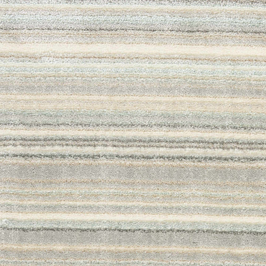 Close-up of Nourison Marmara rug featuring a contemporary striped design in grey, ivory, and teal.