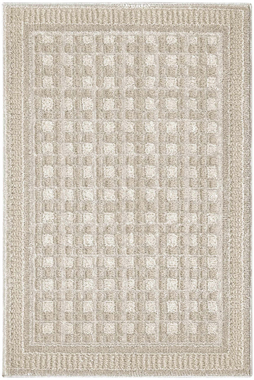 Close-up of the Nourison Nordic Beige rug. Neutral tones and subtle geometric square pattern. Pile texture.