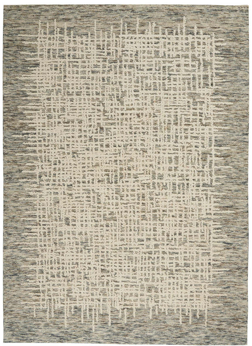 Close-up of the Nourison Colorado Ivory Multicolor rug with a rustic, Southwestern-inspired grid pattern. Handmade wool texture.