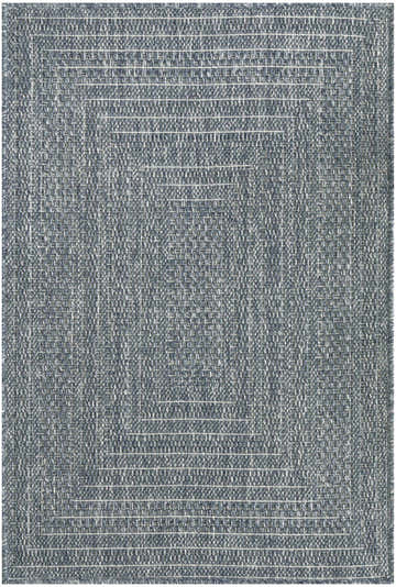 Close-up of the Nourison Tulum Denim Outdoor Area Rug, showing its woven texture and concentric square pattern.