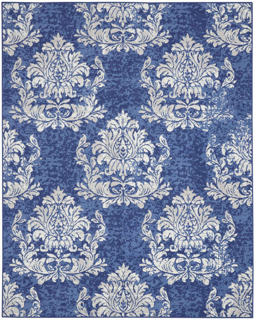 Close-up of the Nourison Whimsicle Navy Ivory rug featuring a detailed damask pattern and textured design.