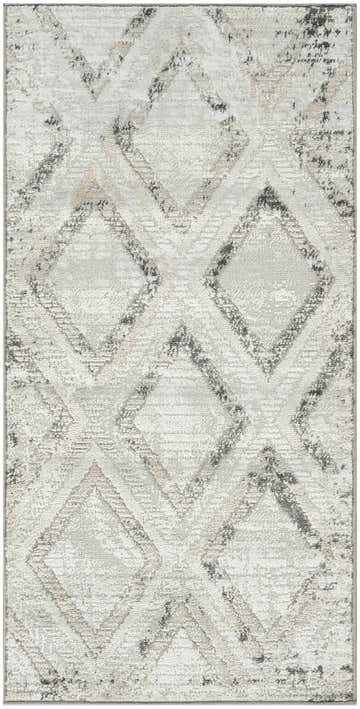 Close-up of the Nourison Dekor Grey Charcoal rug. Mid-century modern style with diamond pattern and high pile texture.