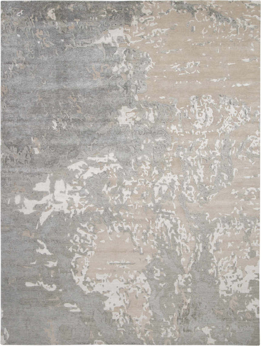Close-up of the Nourison Silk Shadows Sand area rug. Features a modern abstract design in sandstone, gray, and ivory hues.
