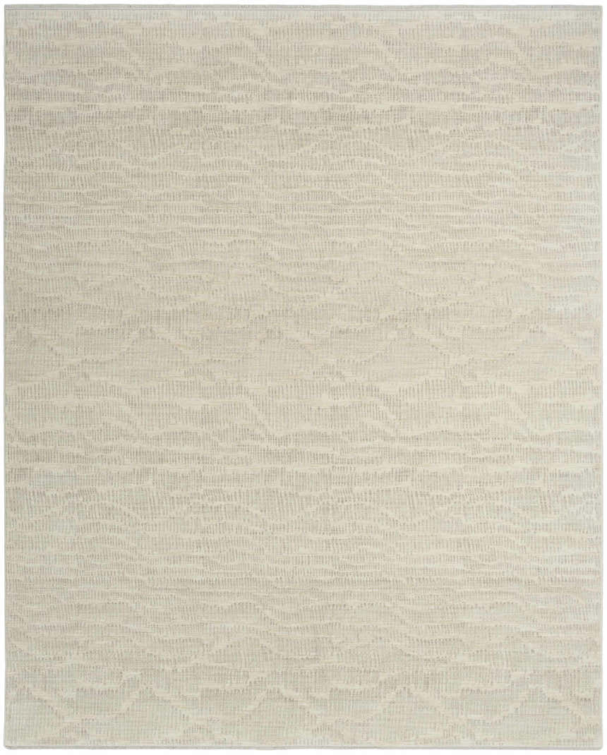 Close-up of Calvin Klein CK079 Notes Ivory Silver rug featuring a subtle, modern, textured pattern.