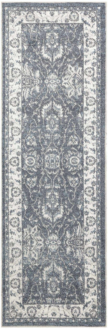 Close-up of Nourison Astra Machine Slate Vintage rug, showing slate blue and taupe vintage pattern.
