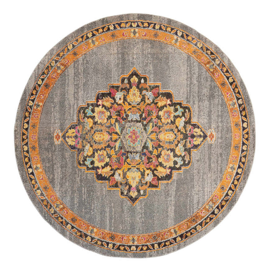 Close-up of a round Nourison Passionate Grey Bohemian Area Rug featuring a colorful floral medallion pattern.