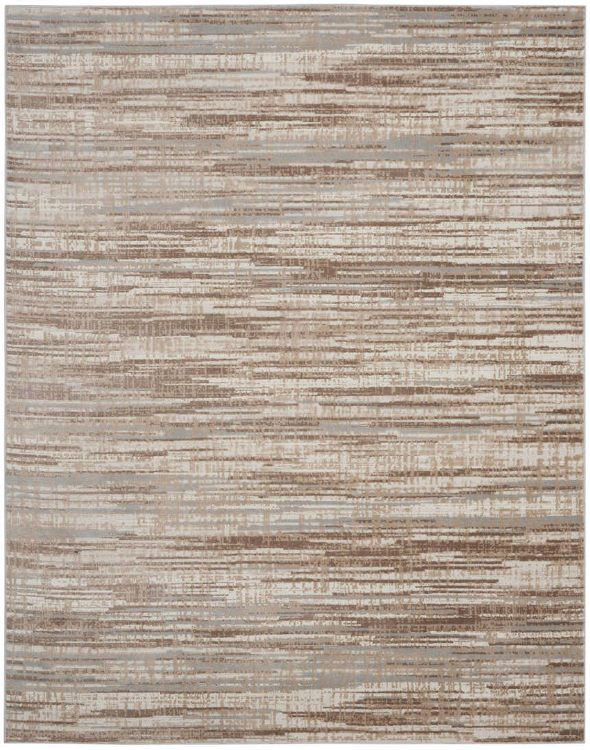 Close-up of Nourison Elation Ivory Grey rug, featuring a modern abstract design with chestnut, ivory, and grey hues. High pile texture.