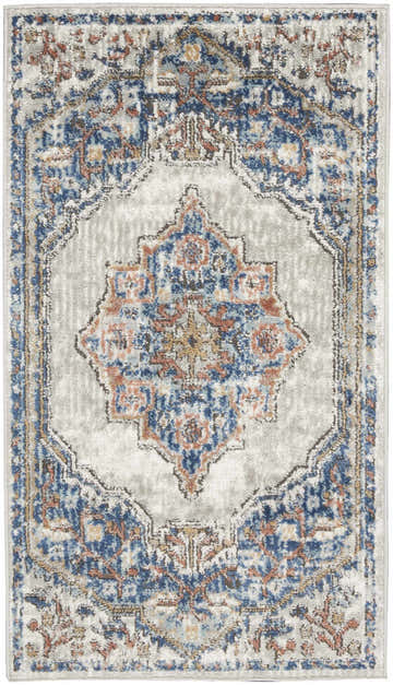 Close-up of the Nourison Quarry Blue Grey Vintage Indoor Area Rug, featuring a central medallion and distressed pattern.