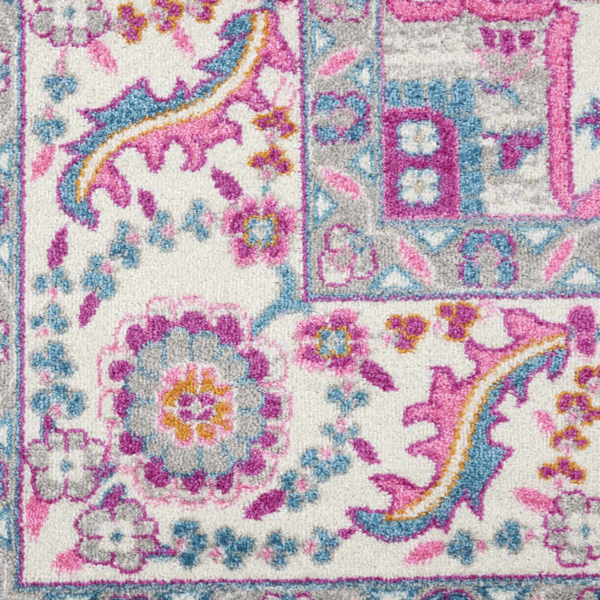 Close-up of Nourison Passion Light Grey Pink Bohemian Indoor Area Rug, showcasing floral and geometric patterns.