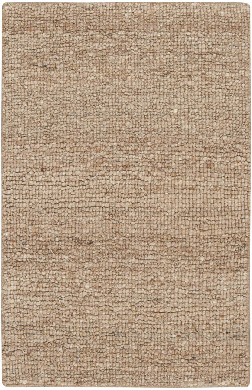 Close-up of the handmade Nourison Alanna Beige rug, showing its textured wool weave and farmhouse style.