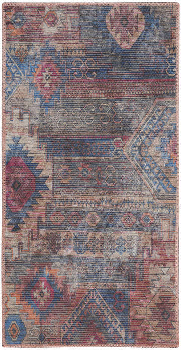 Close-up of Nourison New Concept Multicolor Vintage Area Rug. Distressed geometric and floral pattern in blue, red, and tan.