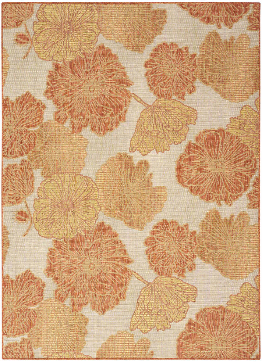 Close-up of Nourison Garden Oasis Coral Tropical Area Rug with a coral and gold floral pattern on a neutral background.