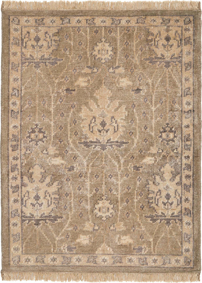 Close up of the Nourison Aldora Opal Grey vintage rug showing the subtle floral pattern and fringe.