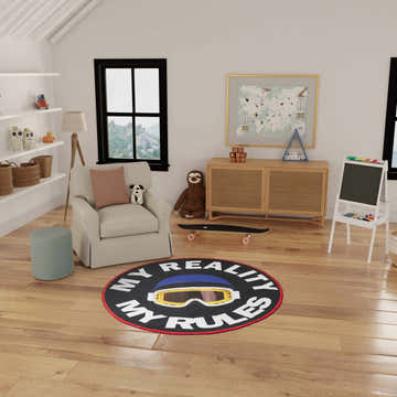 Kids playroom with the Nourison Imagination Multicolor round rug featuring goggles and the words