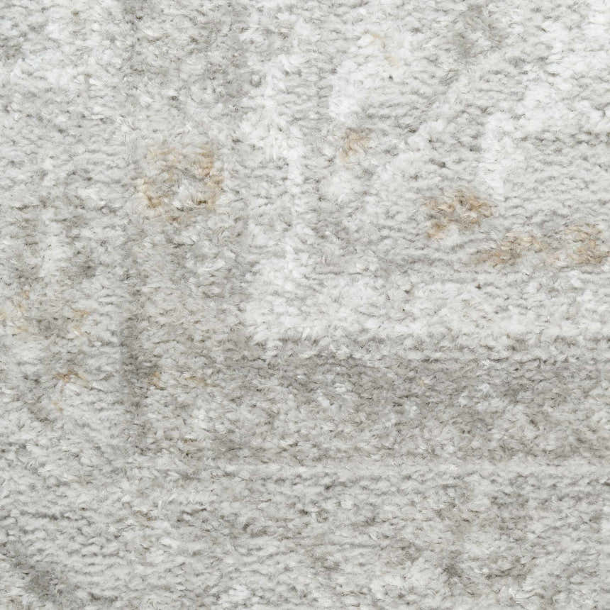 Close-up of the high pile Nourison Dekor Grey Vintage Area Rug, showing texture and subtle vintage pattern.