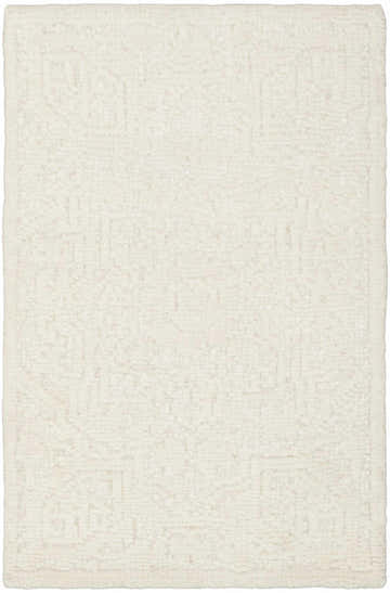 Close-up of the handmade Nourison Blanco Ivory rug. The contemporary wool rug has a subtle geometric pattern and soft texture.