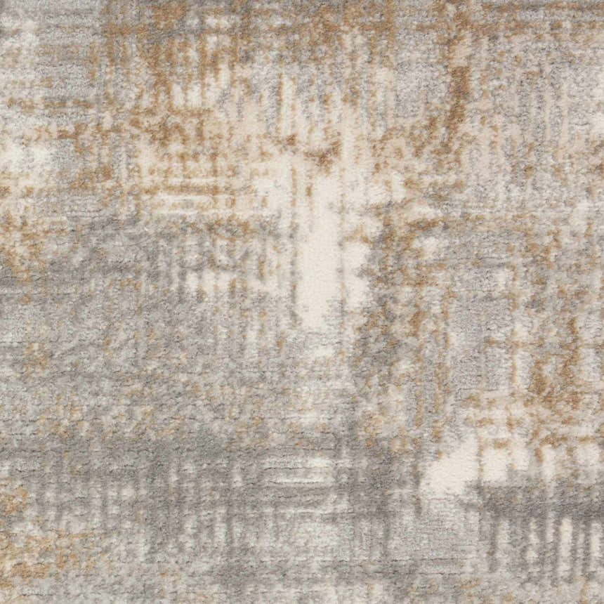 Close-up of Calvin Klein CK950 Rush Grey Beige rug. High pile texture with a modern abstract design in gray, beige, and cream.