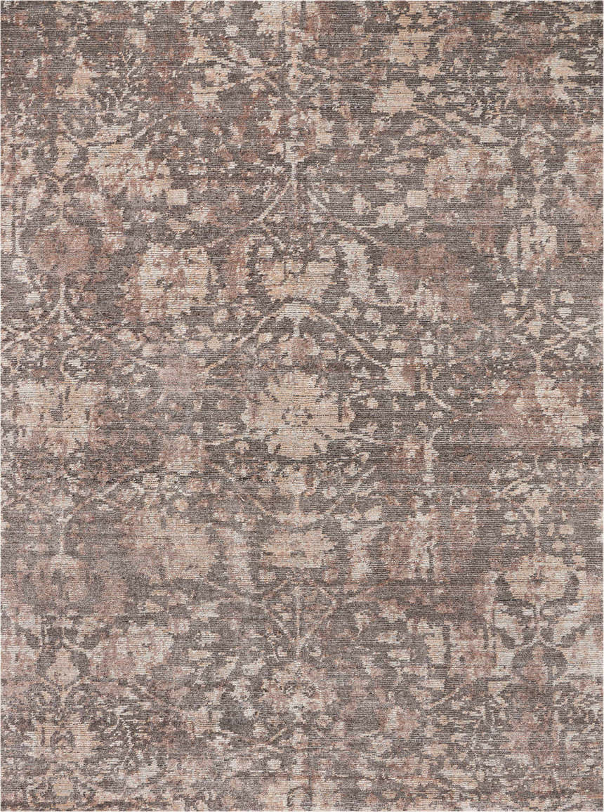 Close-up of the Nourison Lucent Flint Vintage Area Rug, featuring a distressed floral pattern in shades of brown and beige.