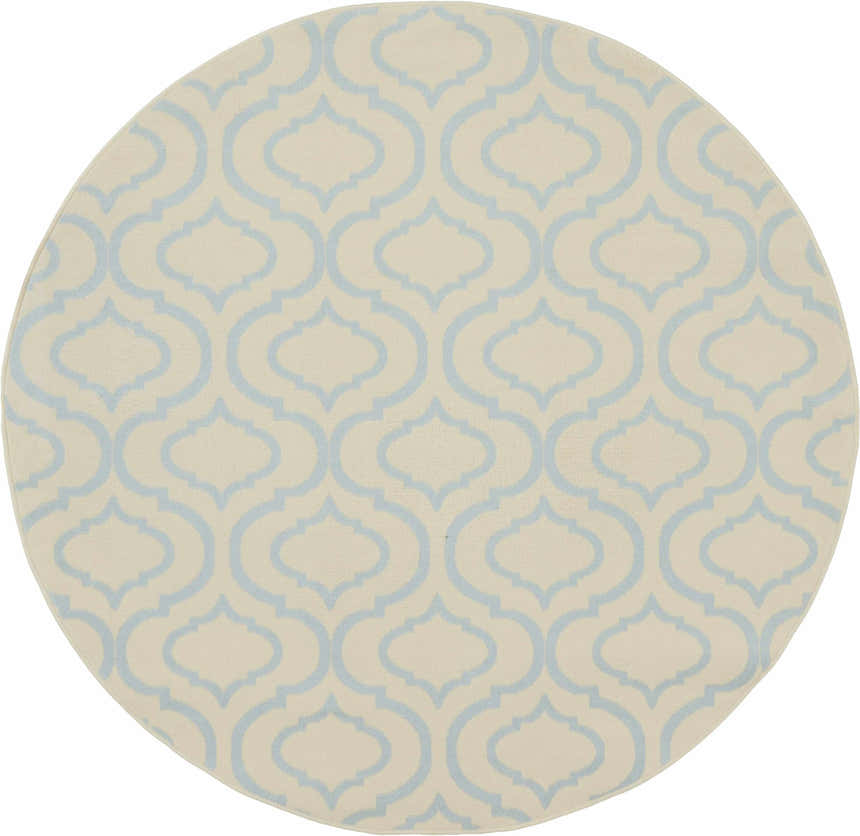 Round Nourison Jubilant Ivory Blue rug with a contemporary quatrefoil pattern. Machine-made polypropylene rug.