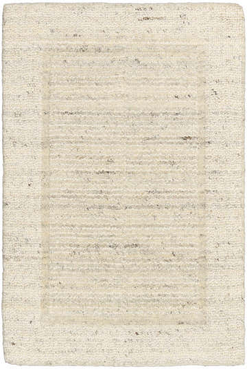 Close-up of the Calvin Klein CK082 Ridge Ivory rug. Handmade wool rug with chestnut accents and a farmhouse style.