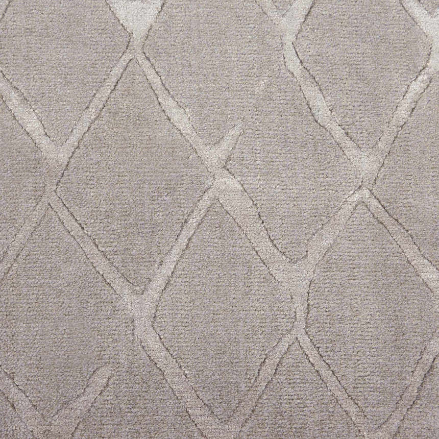Close-up of the grey Nourison Twilight rug featuring a diamond pattern and soft, textured wool and luxcelle blend.
