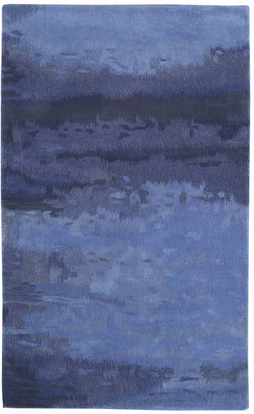 Close-up of Calvin Klein Home Luster Wash Indigo Area Rug. Handmade wool rug with a watercolor-like design in shades of blue and purple.