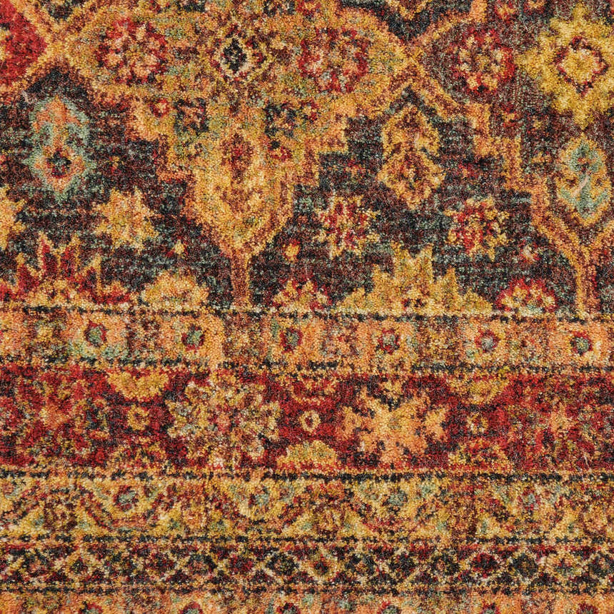 Close-up of Nourison Jewel Blue Red Moroccan rug. Features detailed, colorful traditional patterns and textures.