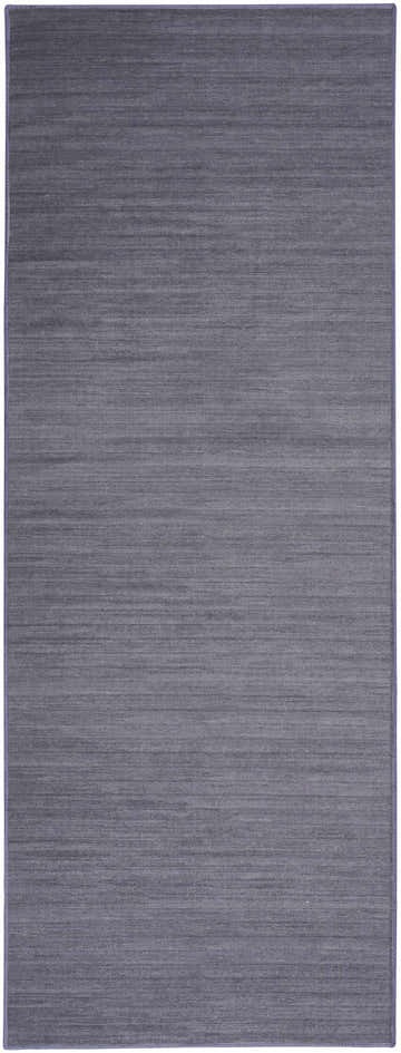 Close-up of Nourison Essentials Navy Modern Indoor Washable Area Rug showing subtle horizontal striations.