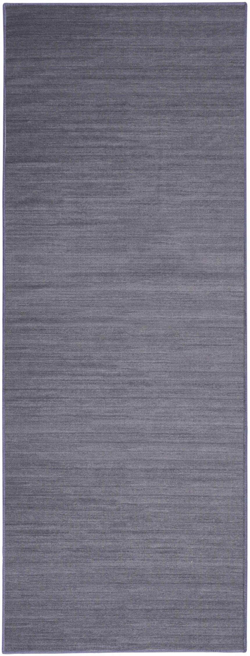 Close-up of Nourison Essentials Navy Modern Indoor Washable Area Rug showing subtle horizontal striations.