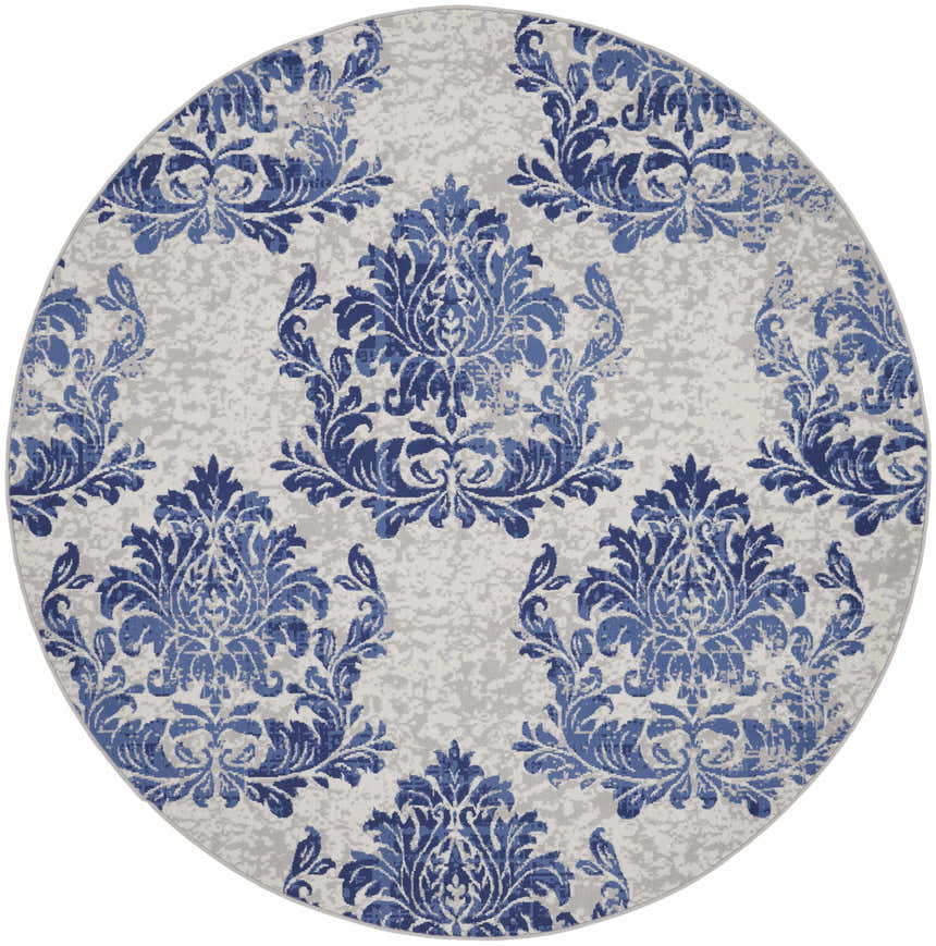 Round Nourison Whimsicle Ivory Navy rug featuring a blue damask pattern on a textured ivory background. Farmhouse style.