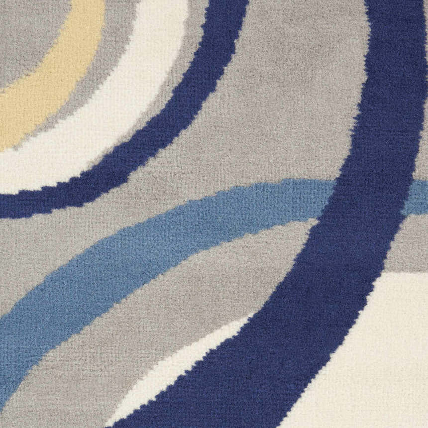 Close-up of the Nourison Grafix Grey rug, featuring a mid-century modern wave pattern in gray, blue, yellow, and white.
