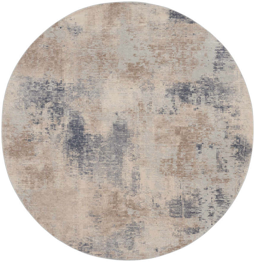 Close up of round Nourison Rustic Textures Beige Grey area rug showing abstract pattern and texture.
