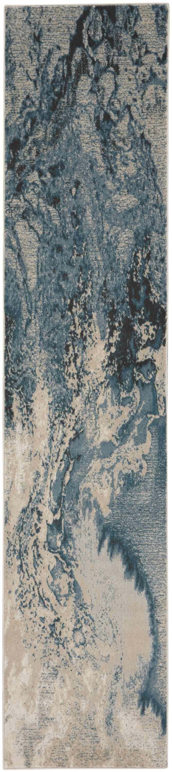 Close-up of Nourison Maxell Ivory/Teal rug. Modern design with chestnut, teal, and ivory abstract pattern. Polyester texture.