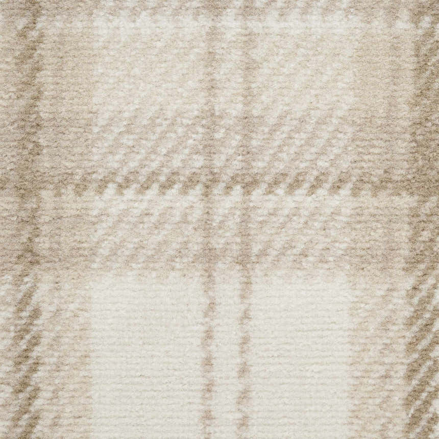 Close-up of the Nourison Grafix Ivory Beige rug showing a subtle chestnut plaid pattern and soft, textured pile.