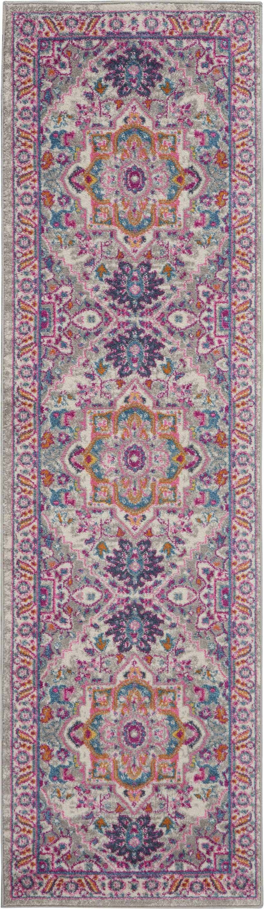 Close-up of Nourison Passion Light Grey Pink Bohemian Indoor Area Rug with floral and geometric designs.