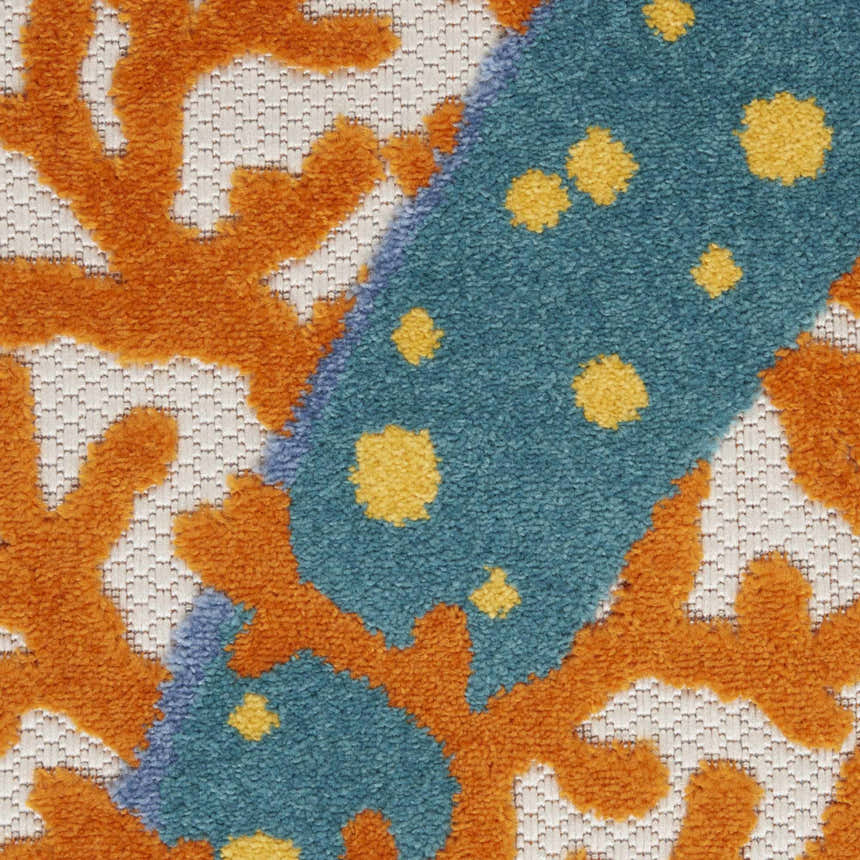 Close-up of Nourison Aloha Multicolor rug showing coral, teal, and yellow coastal pattern and texture.