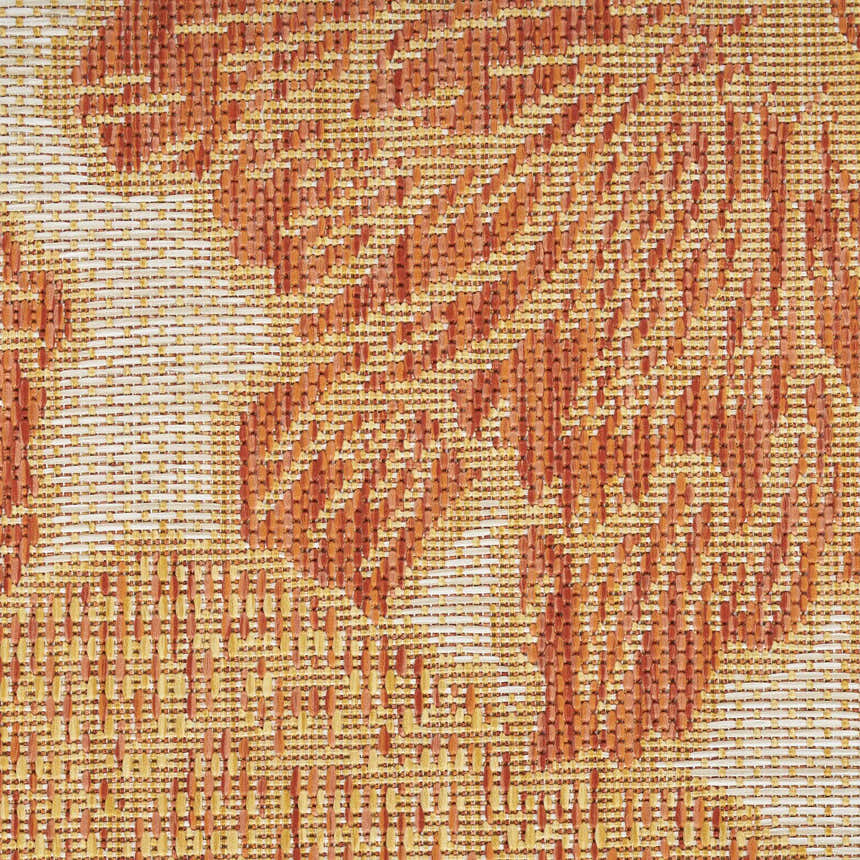 Close-up of the Nourison Garden Oasis Coral Tropical Area Rug showing the coral and woven texture.