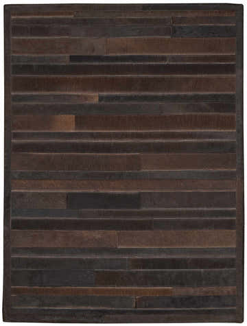 Close-up of the Calvin Klein Home Prairie Sable rug. Handmade, hair on hide rug with horizontal stripes in sable brown tones.