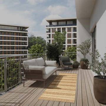Modern balcony with a sofa, chair, and Nourison Horizon Indoor/Outdoor Natural Area Rug in brick red.