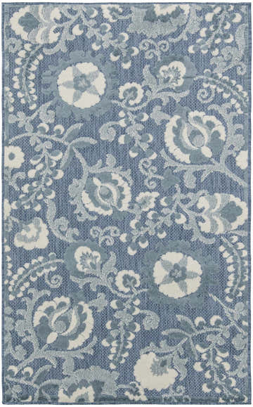 Close-up of the Nourison Aloha Blue Farmhouse Area Rug, featuring a light blue floral pattern and textured pile.