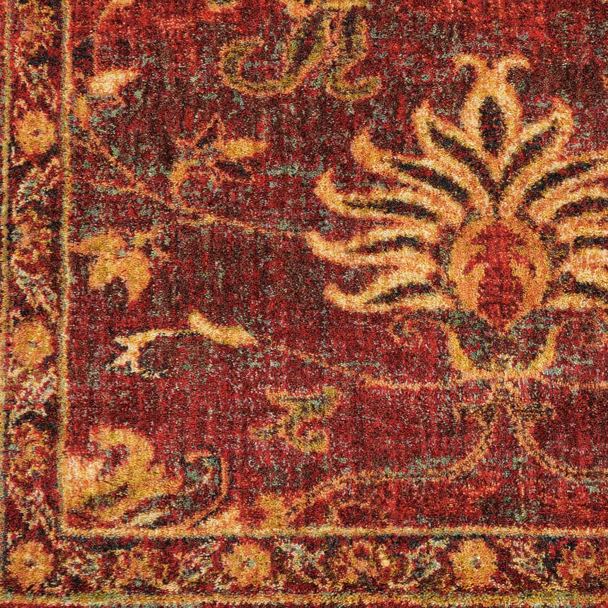 Close-up of the Nourison Jewel Brick Persian rug, showcasing its brick red, gold, and teal floral pattern and textured weave.