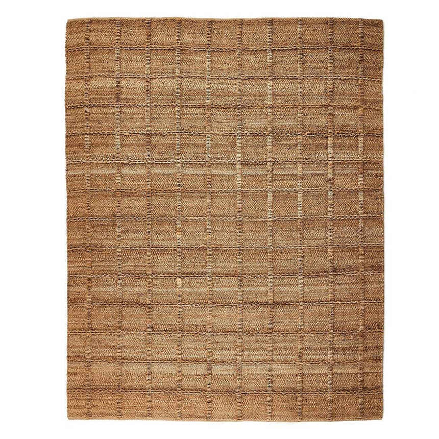 Close-up of the Four Hands Grid Jute Rug. Hand-woven natural jute rug with a grid pattern in natural and jute tones. Design-Rectangle