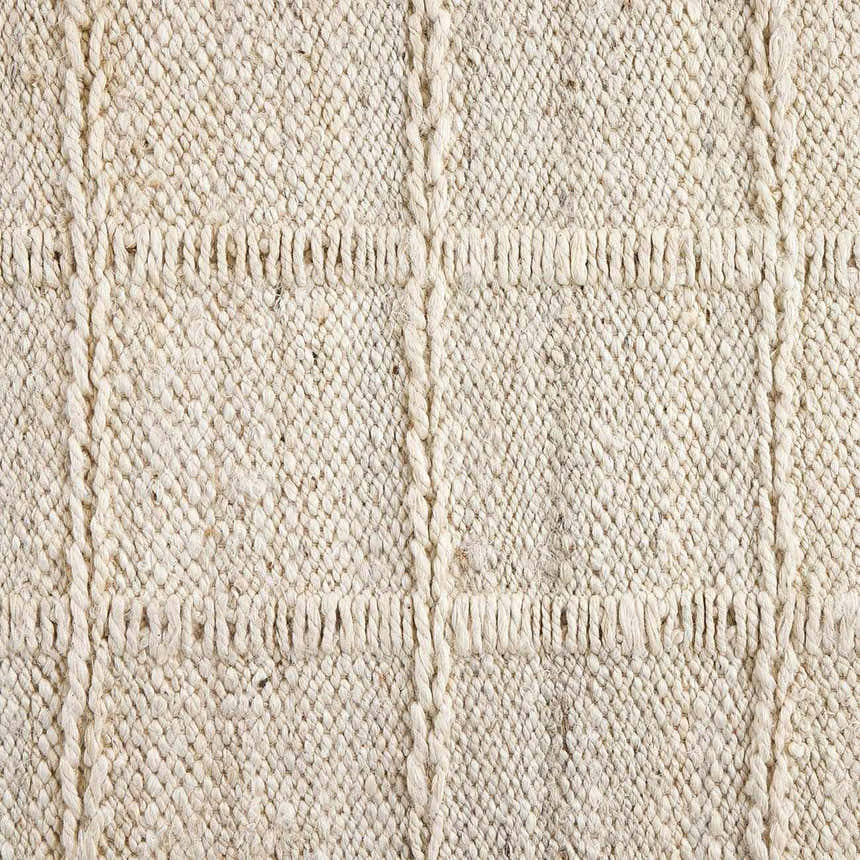 Close up of Four Hands Grid Jute Rug - Bleached Grid Jute, showing texture and woven grid pattern. Texture